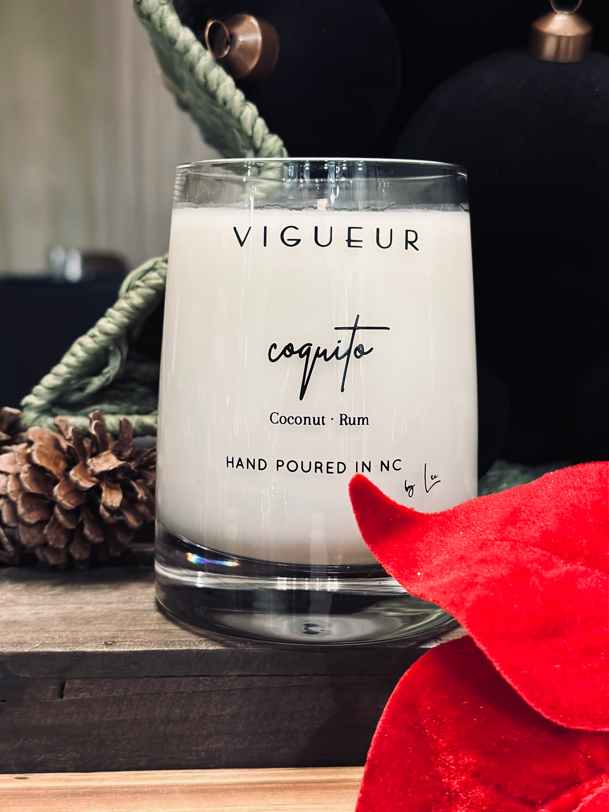 Vigueur Fragrances Coquito soy candle with coconut, cinnamon and rum notes in a clear glass jar