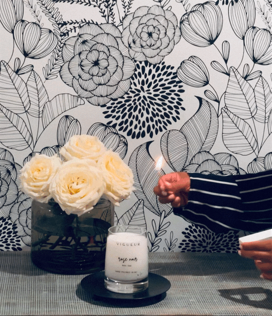 Vigueur Fragrances Rose Noir soy candle with Rose, oud, and floral/woody notes in a clear glass jar