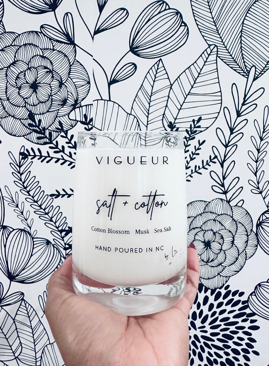 Vigueur Fragrances SALT + COTTON soy candle with cotton blossom, musk and sea salt notes in a clear glass jar