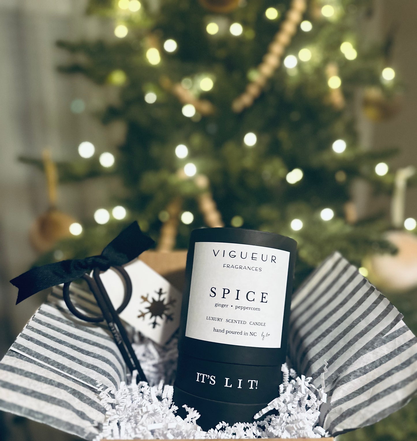 Vigueur Fragrances Spice soy candle with ginger, peppercorn, and spicy/gourmand notes in a black glass jar.