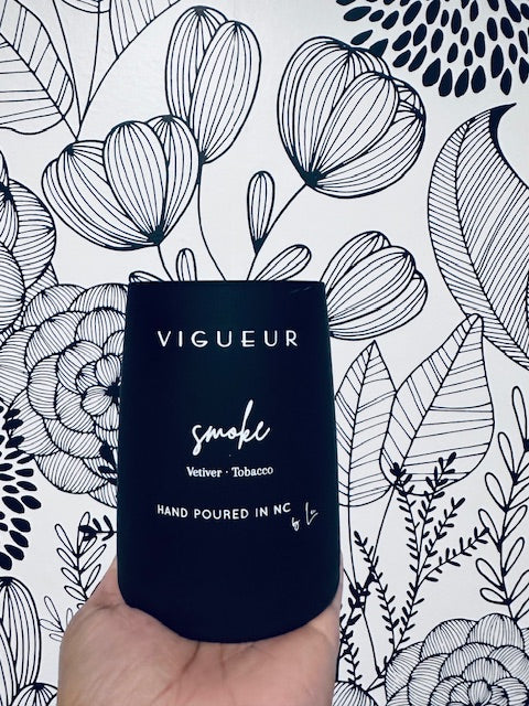 Vigueur Fragrances Smoke soy candle with Vetiver and Tobacco notes in a black glass jar